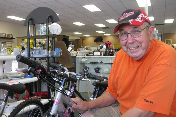 Photo shows that one of the ways to volunterr at Nu2u is to refurbish bicycles.